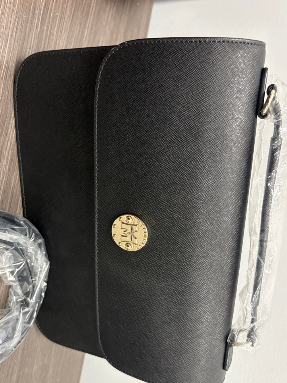 Metro City Black Crossbody with Gold Logo Medallion